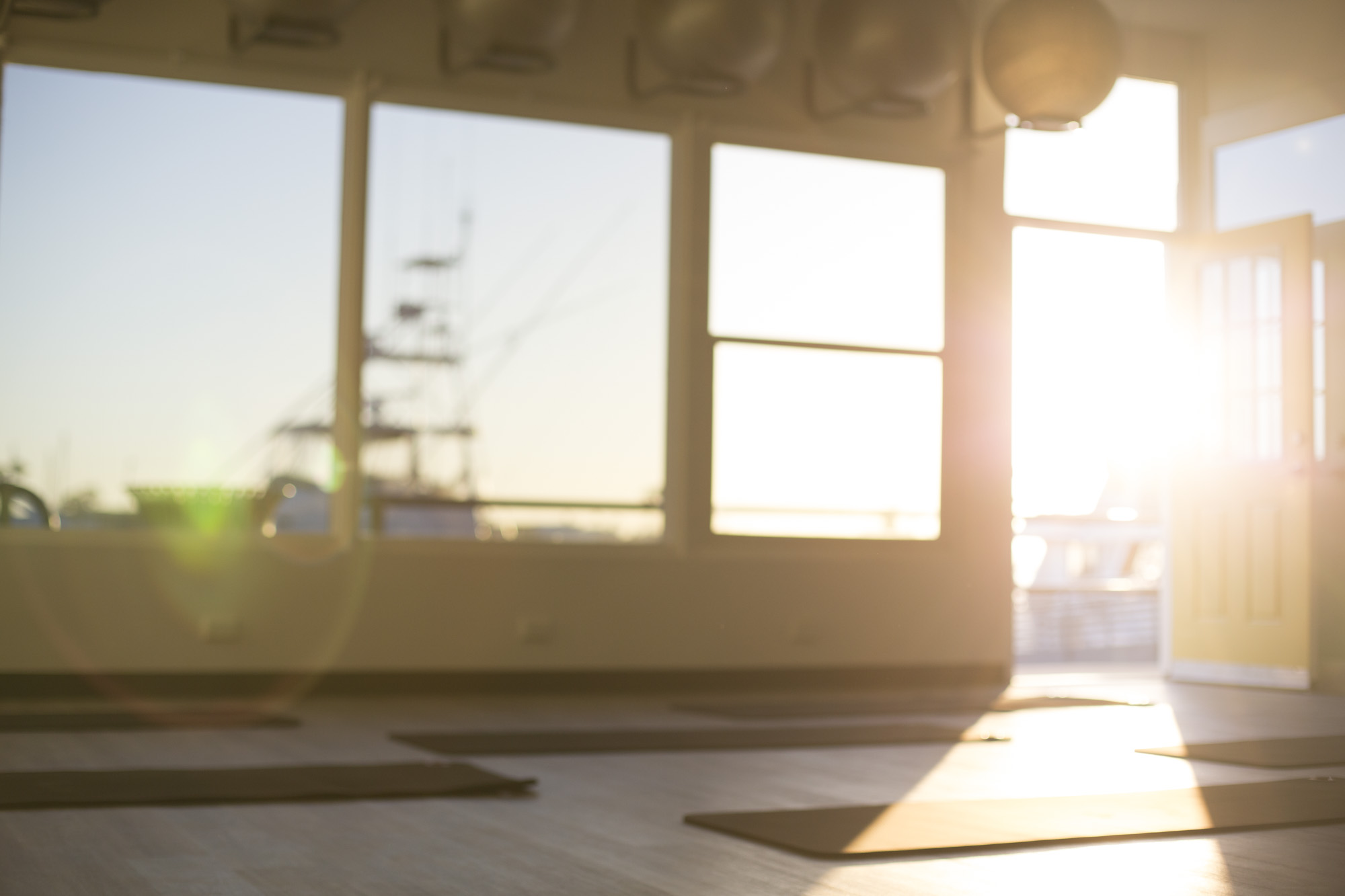 Long Beach pilates studio with open door marina view